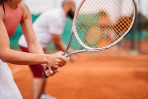 Two people playing tennis